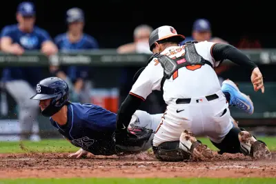 Twins trade for catcher, agree to terms for Justin Topa