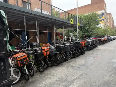 NYC block taken over by migrant workers for delivery bike parking as guard keeps overnight watch