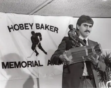 UMD’s Bill Watson puts 1985 Hobey Baker Award up for auction