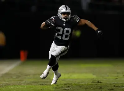 Ex-NFL running back Doug Martin dies in police custody, sources say