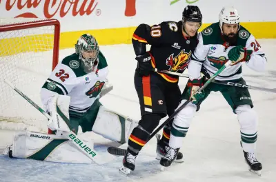 Flames dominate late to douse Wild point streak