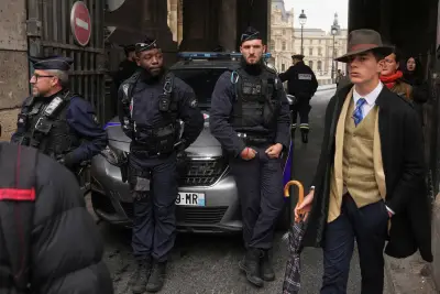 Mysterious ‘Fedora Man’ believed to be French detective outside Louvre is finally unmasked