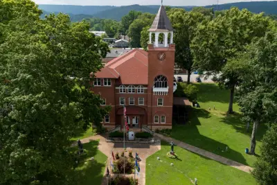 A century after a man was convicted of teaching evolution, the debate on religion in schools rages