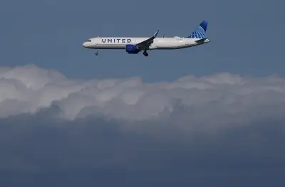 United Airlines flight makes emergency landing after flyer says there was bomb in wife’s luggage