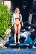 Sydney Sweeney rocks thong bikini while jet skiing with Scooter Braun on Thanksgiving getaway