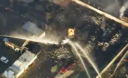 Explosions send propane tanks flying in Lancaster after vehicle fire