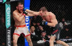 Petr Yan dominates Merab Dvalishvili in stunning fashion to win bantamweight title at UFC 323