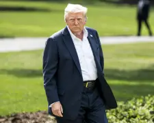 Dow drops nearly 300 points after Trump teases 35% tariff on Canada, new threat to EU