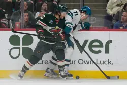 Wild dominate early, but Sharks rally for 2-1 overtime victory