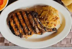 Recipe: French pork chops and gravy from The Magnolia Room (and meet Debra Tardieff) 