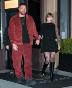 Taylor Swift wears head-to-toe Louis Vuitton with lacy tights for a date night in NYC