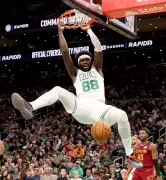 Celtics’ Neemias Queta leaves game vs. Magic with ankle injury