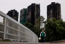 Death toll in Hong Kong fire rises to 146 after more bodies found in apartment complex