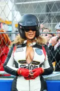 Beyoncé turns heads in form-fitting racing gear while arriving at F1 Grand Prix with Jay-Z
