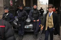 Mysterious ‘Fedora Man’ believed to be French detective outside Louvre is finally unmasked