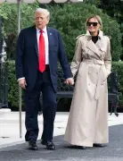 Melania Trump wraps up in floor-length Burberry en route to UK state visit